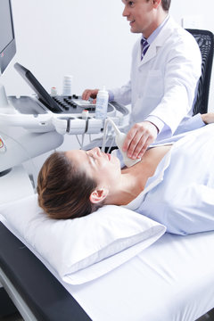 Doctor doing a doppler sonography