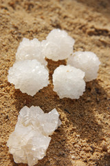 Natural salt of Dead Sea on sand