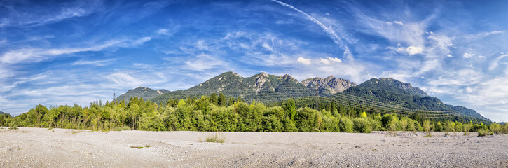 Banks river Isar and Karwendel mountains