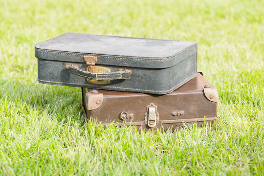 old suitcase on grass