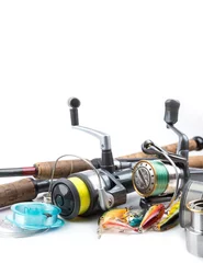 Zelfklevend Fotobehang fishing tackles - rod, reel, line and lures © sytnik
