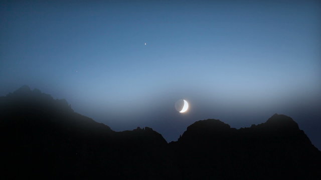 moon setting behind mountains, Turkey