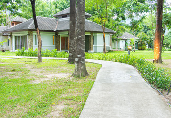 Pathway to residential. Manicured garden design.