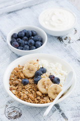 healthy breakfast with cottage cheese, granola and berries