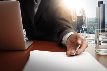 double exposure of businessman or salesman handing over a contra