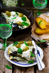 fritatta with eggplants, cheese and olives.