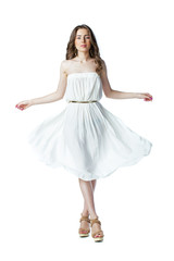 Fototapeta na wymiar Young woman in sexy white dress