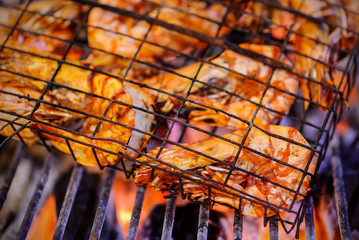 Grilled prawns on flaming in thai seafood restaurant