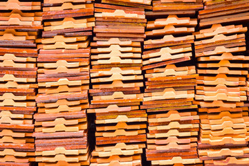 closeup stack of earthenware roof tile prepare for thai traditio