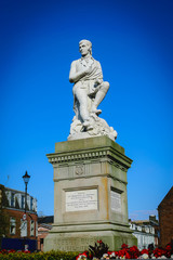 Fototapeta na wymiar Robbie Burns statue at Dumfries, Scotland.