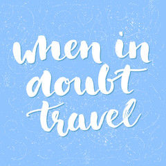 When in doubt travel. Motivational quote at blue grunge