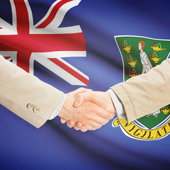 Businessmen handshake with flag on background - British Virgin I