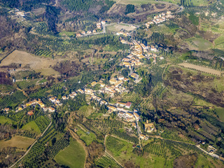 Naklejka premium aerial of a small typical village in the Arezzo region