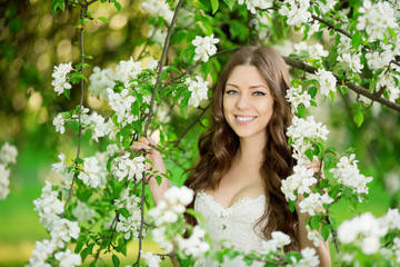 Young spring fashion woman in spring garden Springtime Summertim