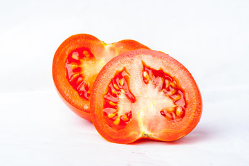 Fresh tomatoes isolated on white