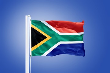 Flag of South Africa flying against a blue sky