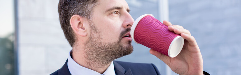 Businessman drinking coffee