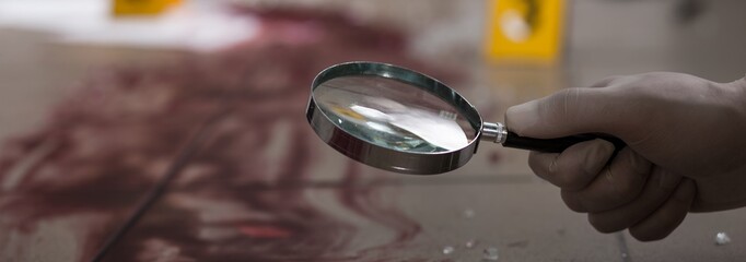 Man with magnifier