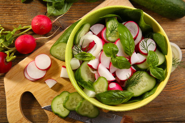 Fresh vegetable salad on table close up