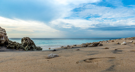 Fototapeta na wymiar Sandy coast of the beach of Dreamland. Bali, Indonesia
