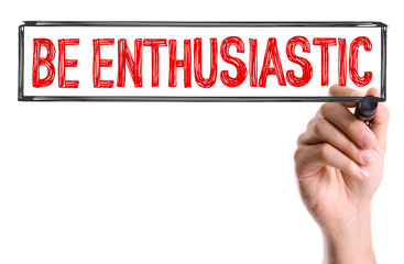 Hand with marker writing the word Be Enthusiastic
