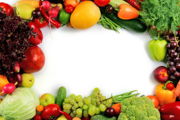 Heap of fruits and vegetables isolated on white