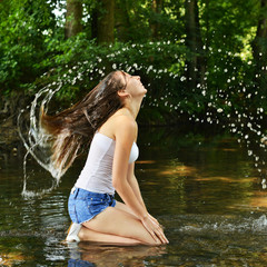 woman splashing water