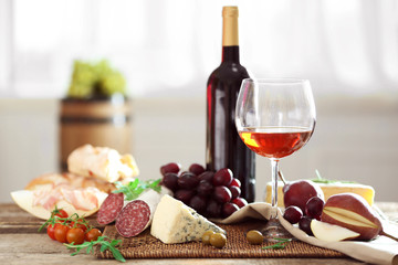 Still life with various types of Italian food and wine