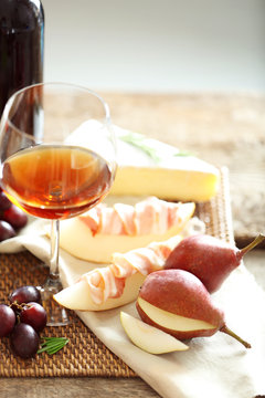 Still life with various types of Italian food and wine