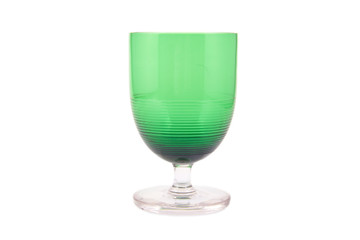 Single vintage green glass on a white background