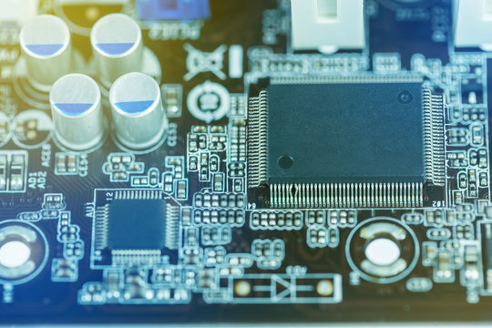 Close up image of electrical circuit mother board from computer