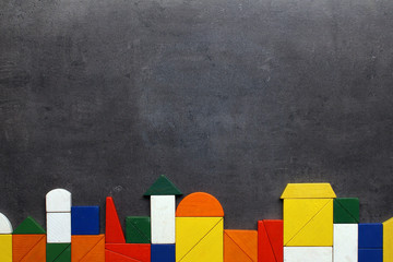 Housing and city development, architecture background made from color wooden blocks with space for...