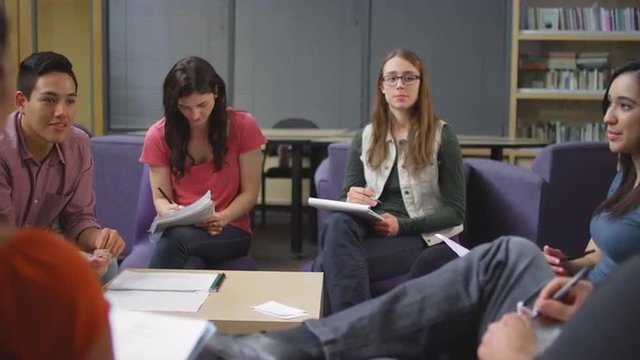 A group of students studying together
