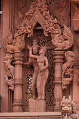 Fototapeta na wymiar Wooden Sculpture in Sanctuary of Truth. Pattaya, Thailand