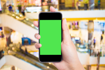 Taking a picture with a smart phone.