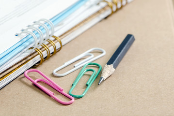 Paper clips and pencil