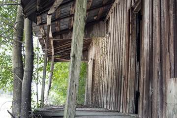 Fototapeta na wymiar Porch of old abandoned house