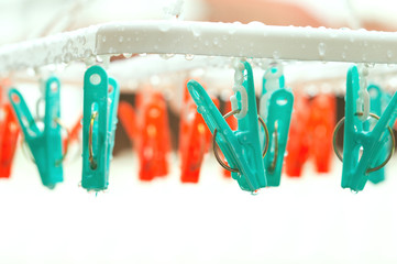 vintage clothespin on rainyday with selective focus on peg