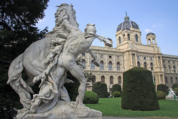 Fototapeta na wymiar Statue near Museum of Natural History and the Art History Museum in Vienna, Austria. The Maria Theresa square.