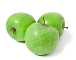 Green apples on a white background