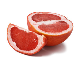 Slices of grapefruit on a white background