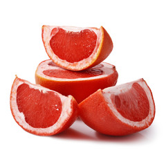 Slices of grapefruit on a white background