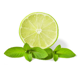 Fresh slice of lime with mint isolated on a white background 