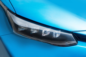 青い車のヘッドライト Headlight of the blue car © norikko