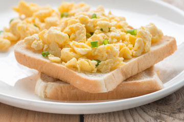 Scrambled eggs on toast, Close up.