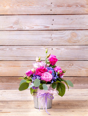 flowers. bouquet of roses on a wooden background