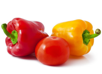 fresh tomato and orange bell pepper on white background