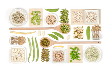 various legumes on white background top view