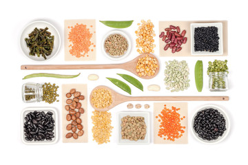 various legumes on white background top view