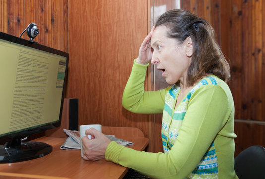 Frightened  Woman  At Computer